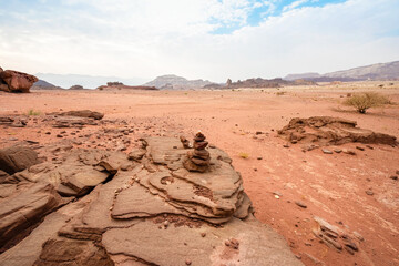 Stones balancing in the desert Timna against the sky. Stone stacking. Arava Valley, Israel. 