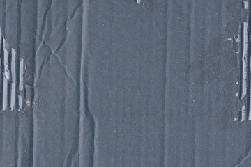 A blue vintage rough sheet of carton. Recycled environmentally friendly cardboard paper texture. Simple minimalist papercraft background.