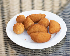 Salgados, salgadinhos, brazilian snacks and party finger food, rissoles, coxinhas, bolinhas de queijo.