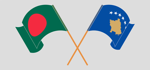 Crossed and waving flags of Bangladesh and Kosovo