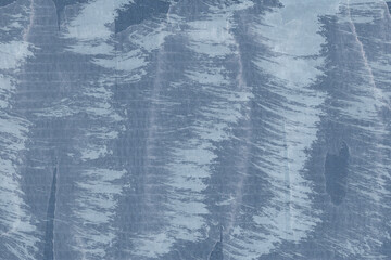 A blue vintage rough sheet of carton. Recycled environmentally friendly cardboard paper texture. Simple minimalist papercraft background.