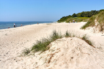 Tourists at the beach in Bakkerne, Bornholm island, Denmark