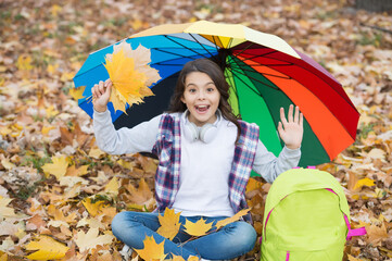 Everyday winner. autumn kid under colorful umbrella. feel the inspiration. happy childhood. back to...