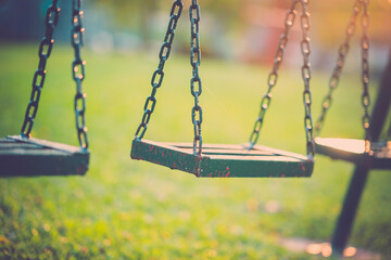 empty chain swing in children playground