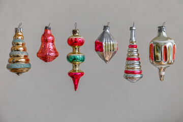 Set of vintage New Year's toys for decorating the Christmas tree on a gray background. Christmas...
