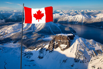 Canadian National Flag Overlay. Aerial View of Beautiful Canadian Mountain Landscape during a sunny and cloudy day. Taken near Squamish and Whistler, North of Vancouver, BC, Canada.