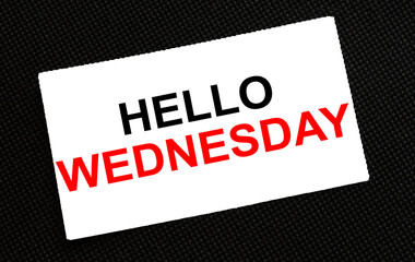 White card on the black background with text Hello Wednesday
