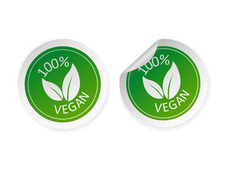 Two green 100 percent vegan stickers set in flat style. Vector illustration.