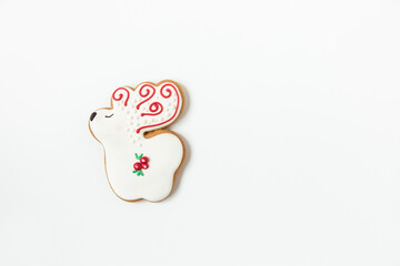 new year and christmas gingerbread cookies. shaped deer. christmas flat lay. white background. minimalist style.