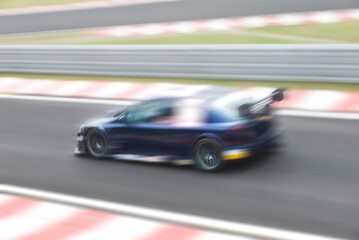 Obraz na płótnie Canvas fast moving car