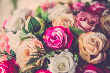 Obraz na płótnie Canvas Valentine day background. Bouquet love roses flower close up. vintage filter
