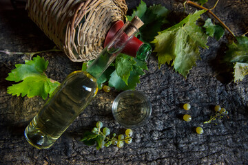 grapes and white wine in the old cellar