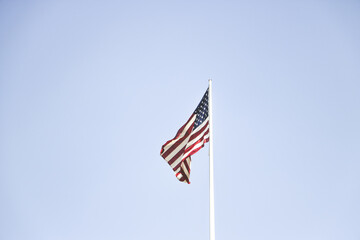 american flag against sky