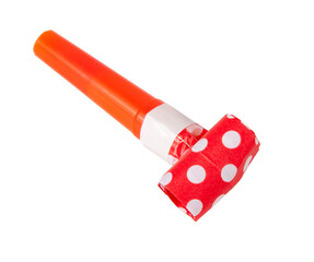 Rolled festive noisemaker or party whistle horn on the white