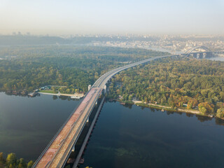 Obraz premium Aerial drone view. A bridge under construction across the Dnieper in Kiev.