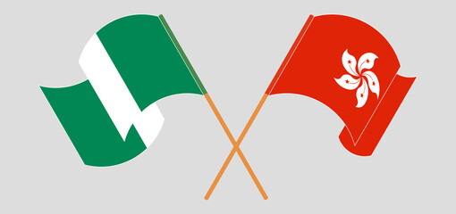 Crossed and waving flags of Nigeria and Hong Kong