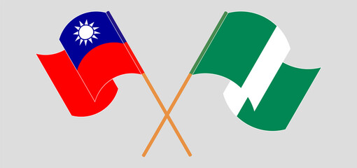 Crossed and waving flags of Nigeria and Taiwan