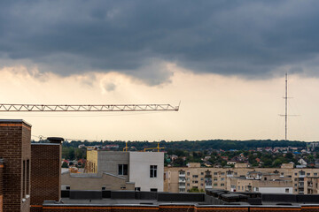 Construction crane. Construction site in sunset