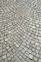 Stone pavement texture. Granite cobblestoned pavement background