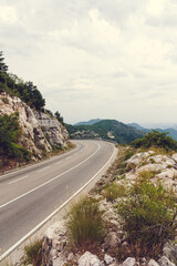Montenegro. Curved road through beautiful green rocky nature landscape