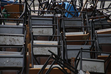 Chairs piled in the street
