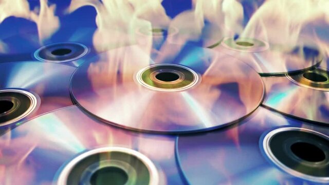 DVDs Being Burned In Flames Tech Concept