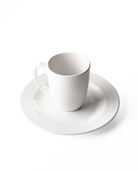 Porcelain cups and plates on white background, photo taken in studio