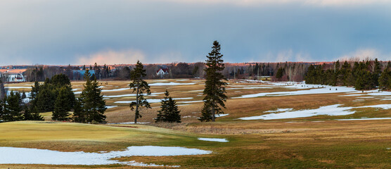 An early spring landscape view of fields in the rural areas of Prince Edward Island