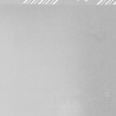 White vintage rough sheet of carton. Recycled environmentally friendly cardboard paper texture. Simple gray minimalist papercraft background.