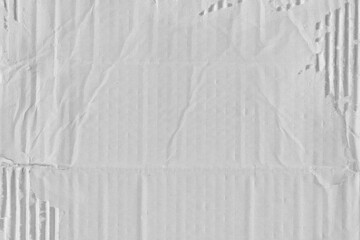 White vintage rough sheet of carton. Recycled environmentally friendly cardboard paper texture. Simple gray minimalist papercraft background.