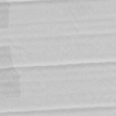 White vintage rough sheet of carton. Recycled environmentally friendly cardboard paper texture. Simple gray minimalist papercraft background.