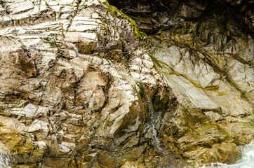 Just a trickle - Forging a different path a slight trickle of water flows off the rocks at the side of Little Qualicum Falls