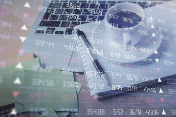 Double exposure of forex chart drawing and desktop with coffee and items on table background. Concept of financial market trading