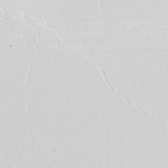White vintage rough sheet of carton. Recycled environmentally friendly cardboard paper texture. Simple gray minimalist papercraft background.