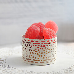 berry marmalade in a white Cup on a light background