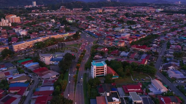 Aerial Footage of local lifestyle residential housing during twilight sunset at Kota Kinabalu city, Sabah, Malaysia