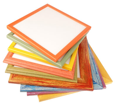Colorful pile of picture frames art framework isolated on white background