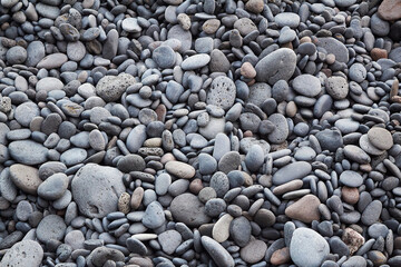 Rocks that are textured to a beach