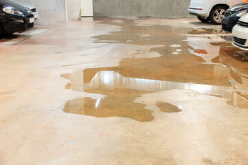Parking flooded with water due to external leaks