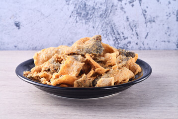 Salted egg crispy fish skin on the plate