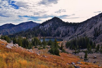 Lake Catherine panorama views from hiking trail to Sunset Peak on the Great Western Trail by Brighton Resort. Rocky Mountains, Wasatch Front, Utah. United States.