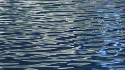 Deep focus photo of rippled blue water suitable as a background.