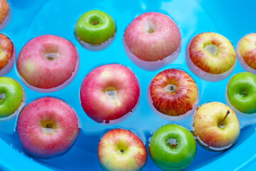 Washing fresh apples in the water