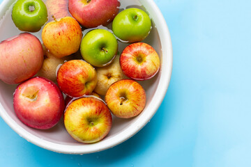 Washing fresh apples in the water