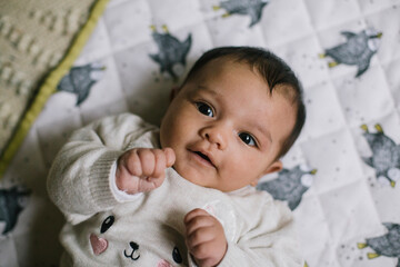 Baby on White Blanket
