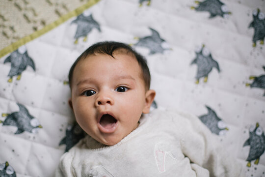 Baby on White Blanket