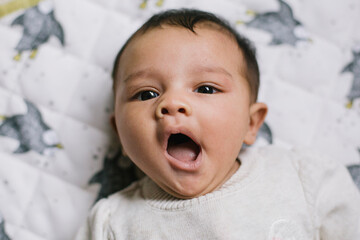 Baby on White Blanket