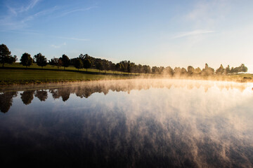 Naklejka premium Sunrise over the lake