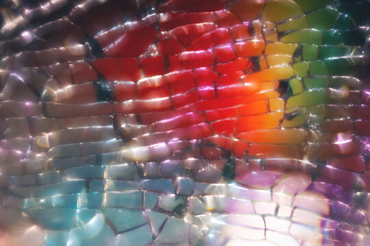 Colorful abstract through shattered glass