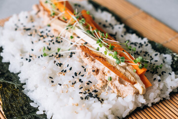 Making vegan maki sushi